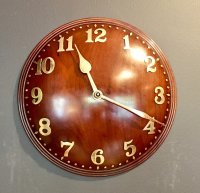 OI957 TWENTIES MAHOGANY ZENITH WALL CLOCK